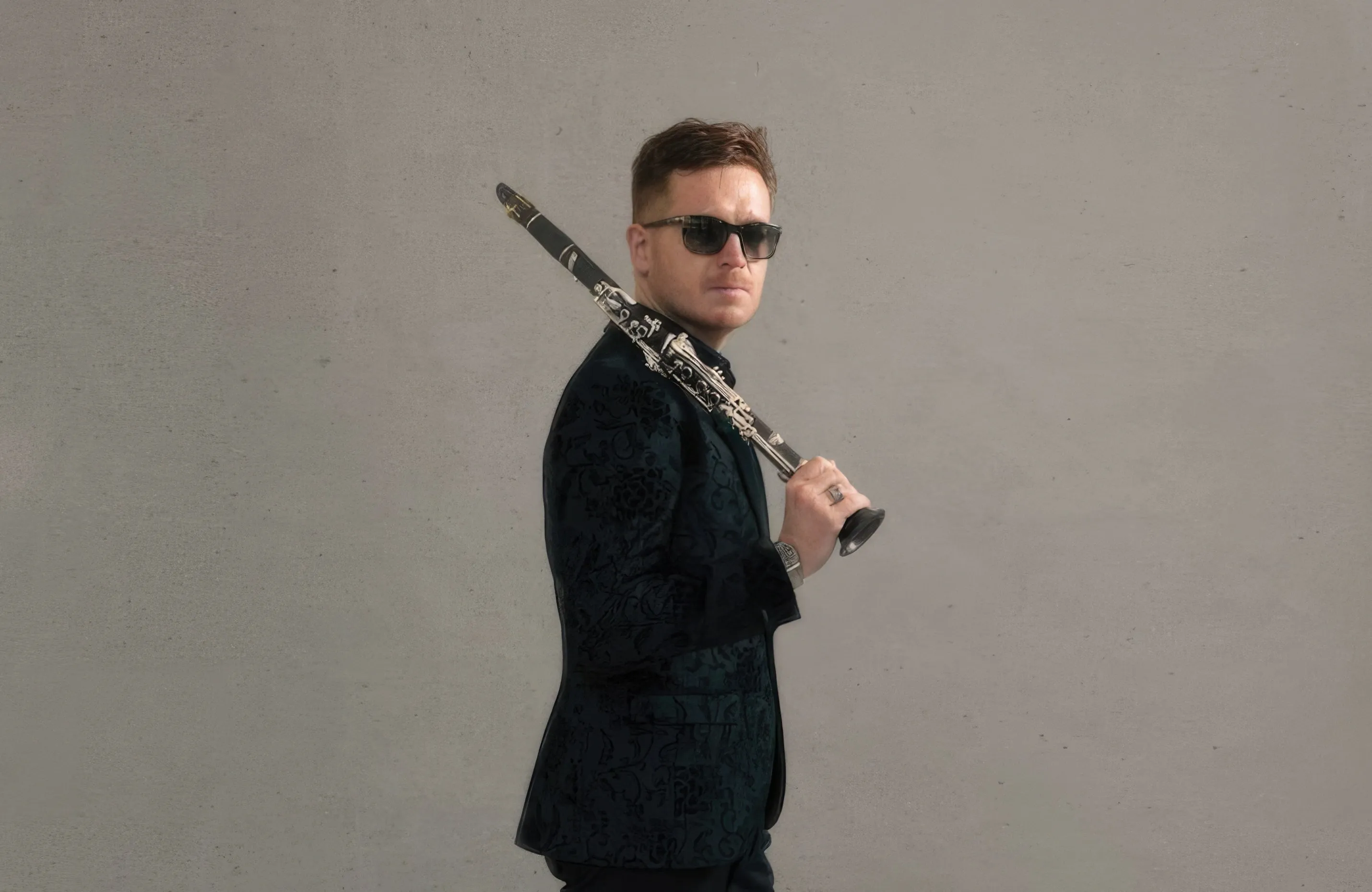James Meldrum with his clarinet over one shoulder